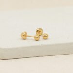 Topos De Oro Amarillo 18K Esfera Lisa Con Broche Rosca