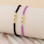 Pulsera De Oro 18K Infinitos Hilo Negro Y Purpura - Imagen 2