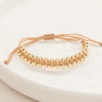 Pulsera Oro 18K Magramé Con Esferas Lisas Hilo Café