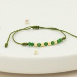 Pulsera Oro 18K Tejida Con Piedras Verdes Esferas Lisas  Hilo Verde