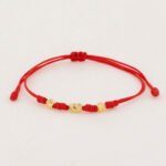 Pulsera De Oro 18K Macramé Con Cilindros Diamantados Hilo Rojo