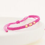 Pulsera De Oro 18K Macramé Con Cilindro Diamantado 4X6Mm Esferas Diamantadas Hilo Rosados . Largo