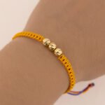 Pulsera Oro 18K Con Esferas Diamantadas Tejida Con Hilo Tricolor - Imagen 3